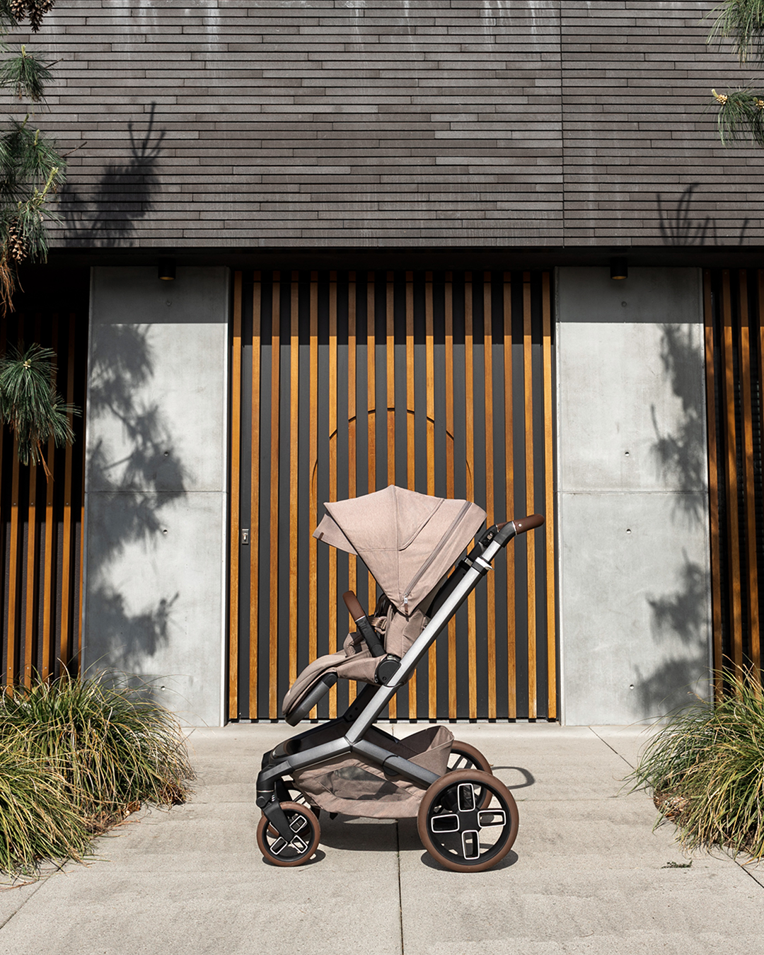 mama con maxicosi fame